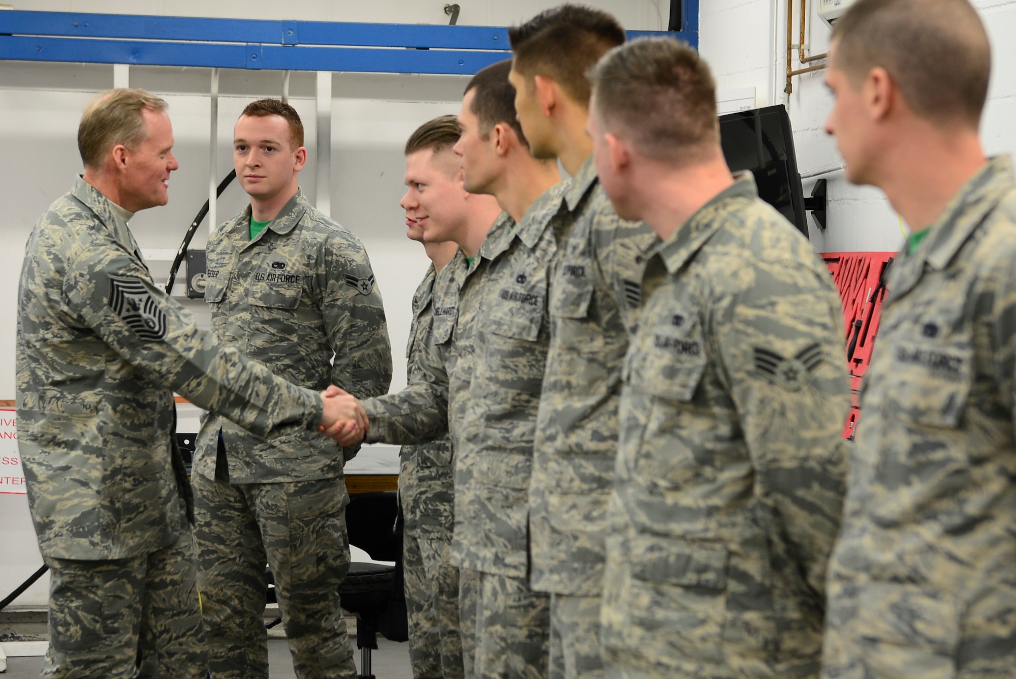 Chief Master Sgt. meets the Airmen from 48th Component Maintenance Squadron Egress shop during his tour of the Royal Air Force Lakenheath, England, January 28, 2016. He spoke with Airmen throughout the wing and expressed his appreciation for the way the Liberty Wing executes the mission and strives for excellence. (U.S. Air Force photo by Senior Airman Dawn M. Weber/Released)