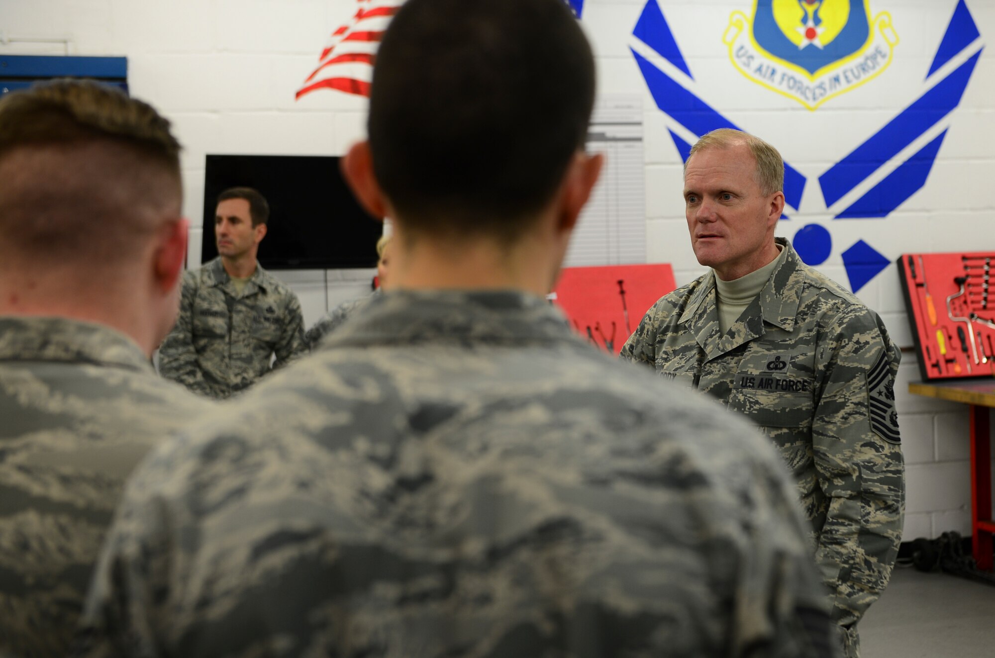 Chief Master Sgt. of the Air Force James Cody mentors Airmen from the 48th Component Maintenance Squadron Egress shop during his tour of Royal Air Force Lakenheath, England, January 29, 2016. Cody’s visit to the base was part of his trip to Europe to tour bases throughout U.S. Air Forces in Europe. (U.S. Air Force photo by Senior Airman Dawn M. Weber/Released)