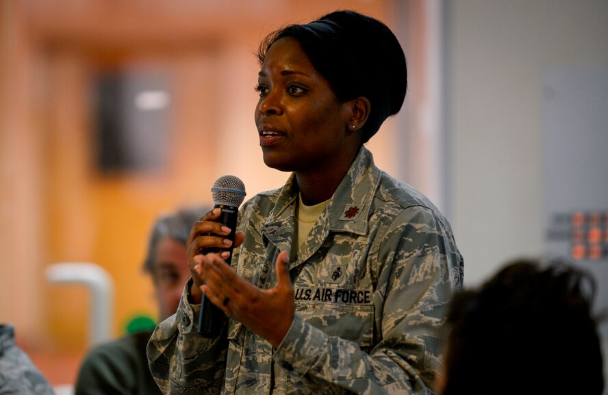 Maj. Janelle Quinn 86th Medical Group (waiting on duty title), speaks to Ramstein leaders during a marriage panel Jan. 22, 2015, at Ramstein Air Base, Germany. Four senior leaders and their spouses gathered at the Ramstein Community Center to speak about how to make marriage withstand the test of time. (U.S. Air Force photo/Senior Airman Nicole Sikorski)