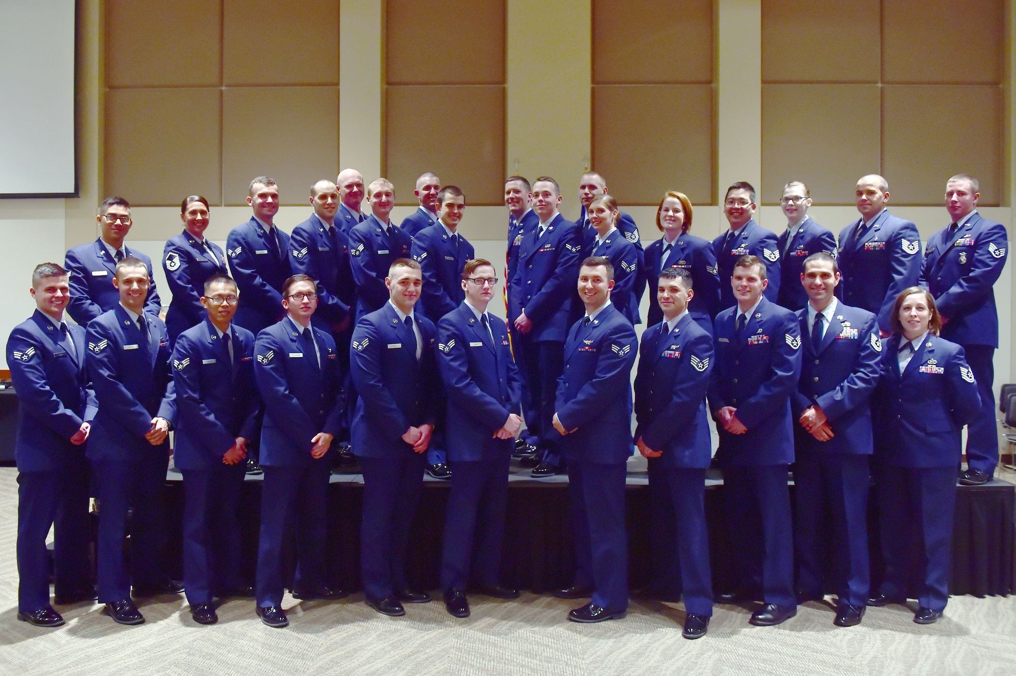 Team Buckley members were promoted to their next ranks Jan. 29, 2016, at the Leadership Development Center on Buckley Air Force Base, Colo. A promotion ceremony is a time-honored tradition in the Air Force, allowing co-workers, family and friends to support and congratulate Airmen on their promotion. (U.S. Air Force photo by Airman 1st Class Luke W. Nowakowski/Released)