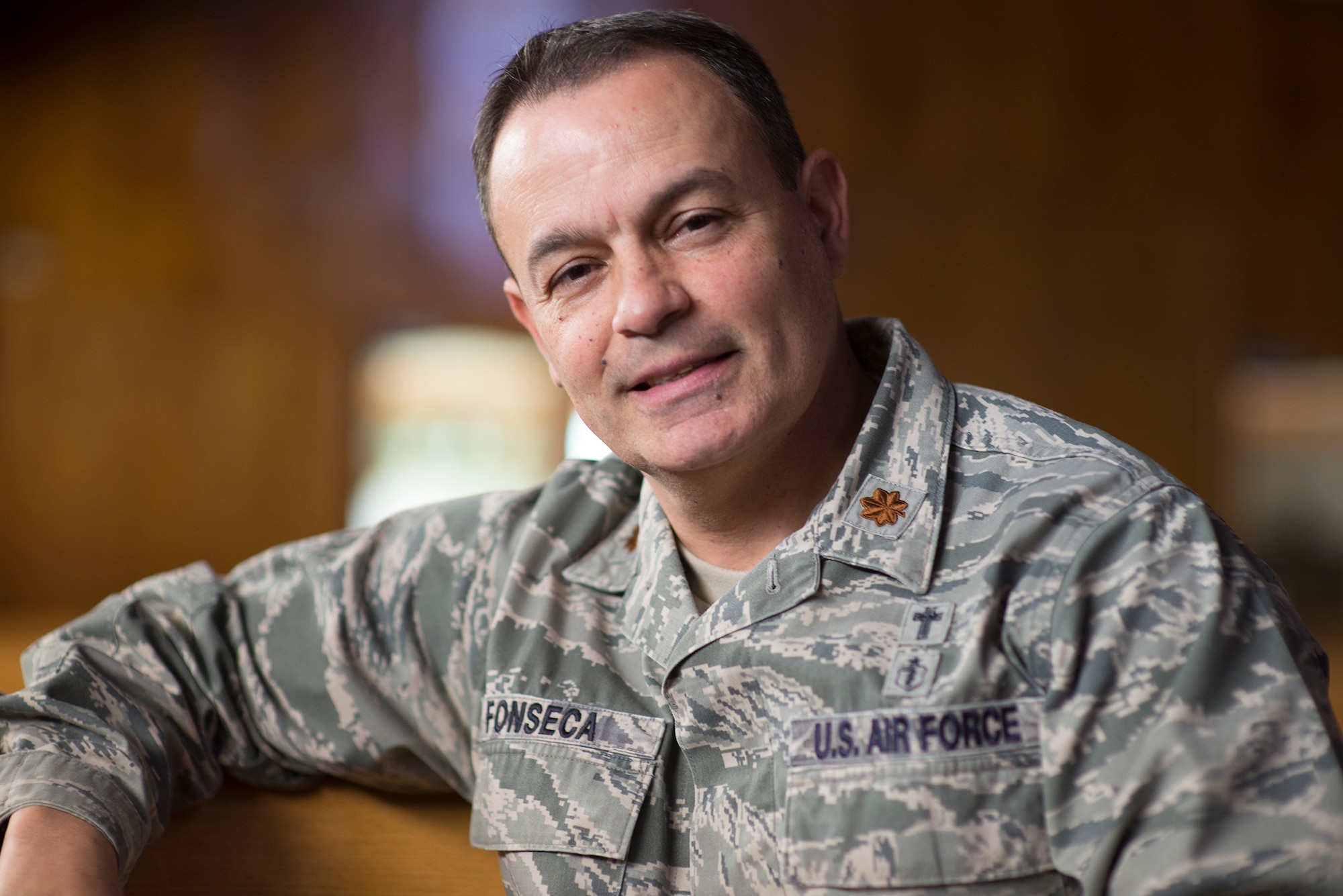 Maj. Oscar Fonseca, 374th Wing Staff Agency deputy wing chaplain, poses for a photo at Yokota Air Base, Japan, Jan. 28, 2016. Fonseca served seven years in the Air Force as a physical therapist before becoming an ordained Roman Catholic Priest and chaplain. (U.S. Air Force photo by Senior Airman David C. Danford/Released)