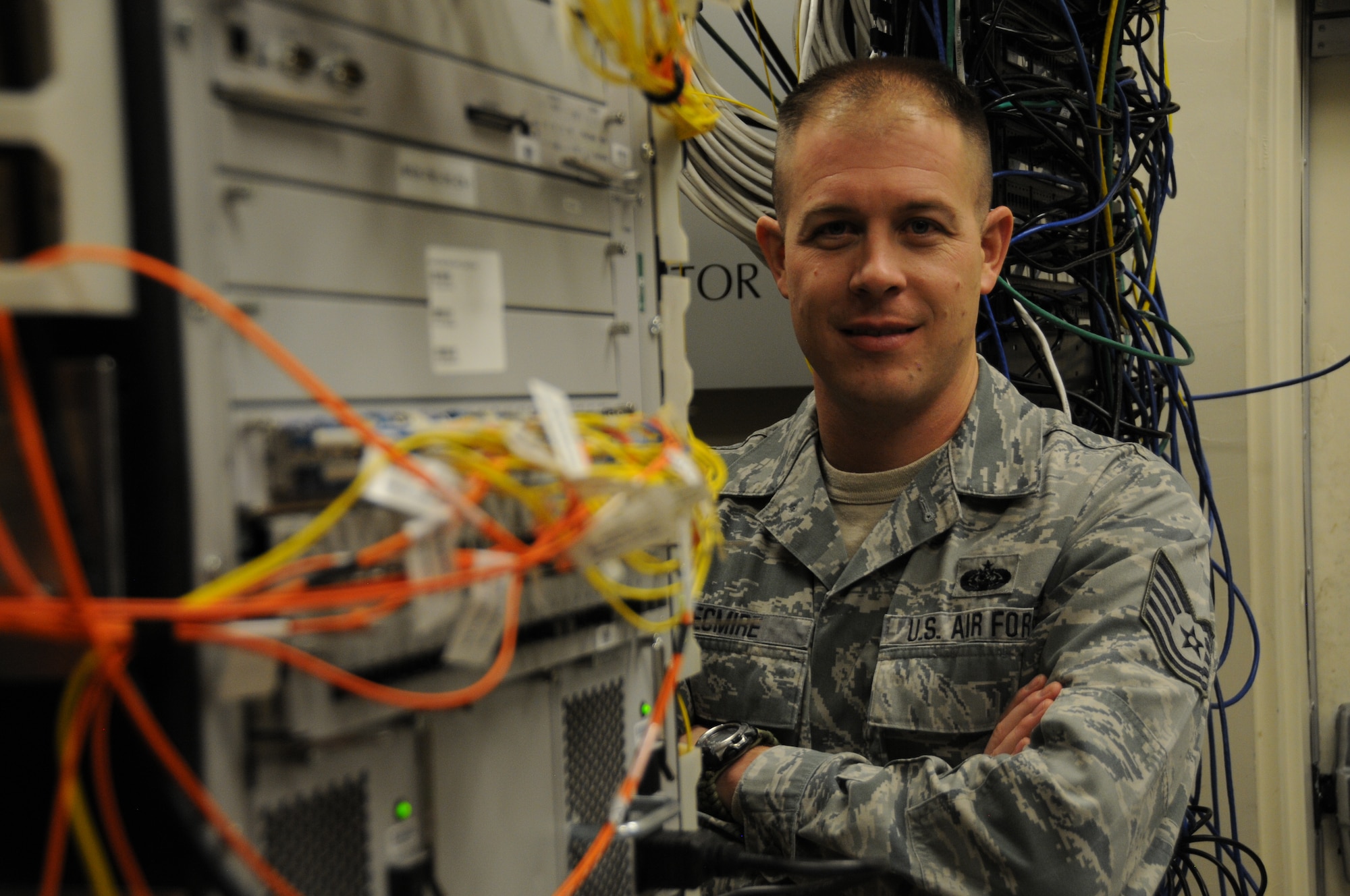 U.S. Air Force Tech. Sgt. Kyle Tecmire, a traditional guardsman, is a 173rd Communications Flight Quality Assurance Inspector.  During the week, Tecmire is a firefighter with the Kingsley Field Fire Department.  (U.S. Air National Guard photo by Tech. Sgt. Jefferson Thompson/released)