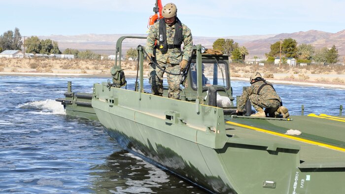 Marines with 7th Engineer Support Battalion from Marine Corps Base Camp Pendleton, Calif., test Improved Ribbon Bridge components with representatives from Marine Corps Systems Command, and Marine Corps Engineer School, at Production Plant Barstow's test pond aboard Marine Corps Logistics Base Barstow’s Yermo Annex, Calif., Jan. 25, 2016