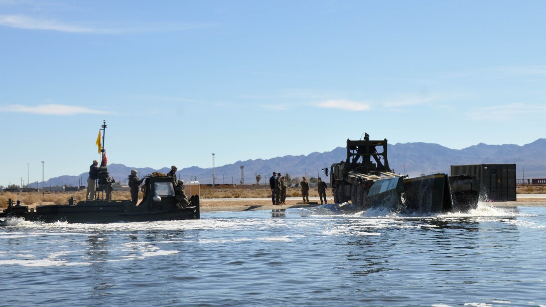 Marines with 7th Engineer Support Battalion from Marine Corps Base Camp Pendleton, Calif., test Improved Ribbon Bridge components with representatives from Marine Corps Systems Command, and Marine Corps Engineer School, at Production Plant Barstow's test pond aboard Marine Corps Logistics Base Barstow’s Yermo Annex, Calif., Jan. 25, 2016