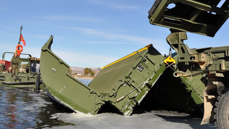 Marines with 7th Engineer Support Battalion from Marine Corps Base Camp Pendleton, Calif., test Improved Ribbon Bridge components with representatives from Marine Corps Systems Command, and Marine Corps Engineer School, at Production Plant Barstow's test pond aboard Marine Corps Logistics Base Barstow’s Yermo Annex, Calif., Jan. 25, 2016