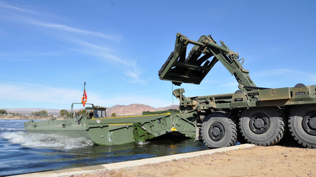 Marines with 7th Engineer Support Battalion from Marine Corps Base Camp Pendleton, Calif., test Improved Ribbon Bridge components with representatives from Marine Corps Systems Command, and Marine Corps Engineer School, at Production Plant Barstow's test pond aboard Marine Corps Logistics Base Barstow’s Yermo Annex, Calif., Jan. 25, 2016