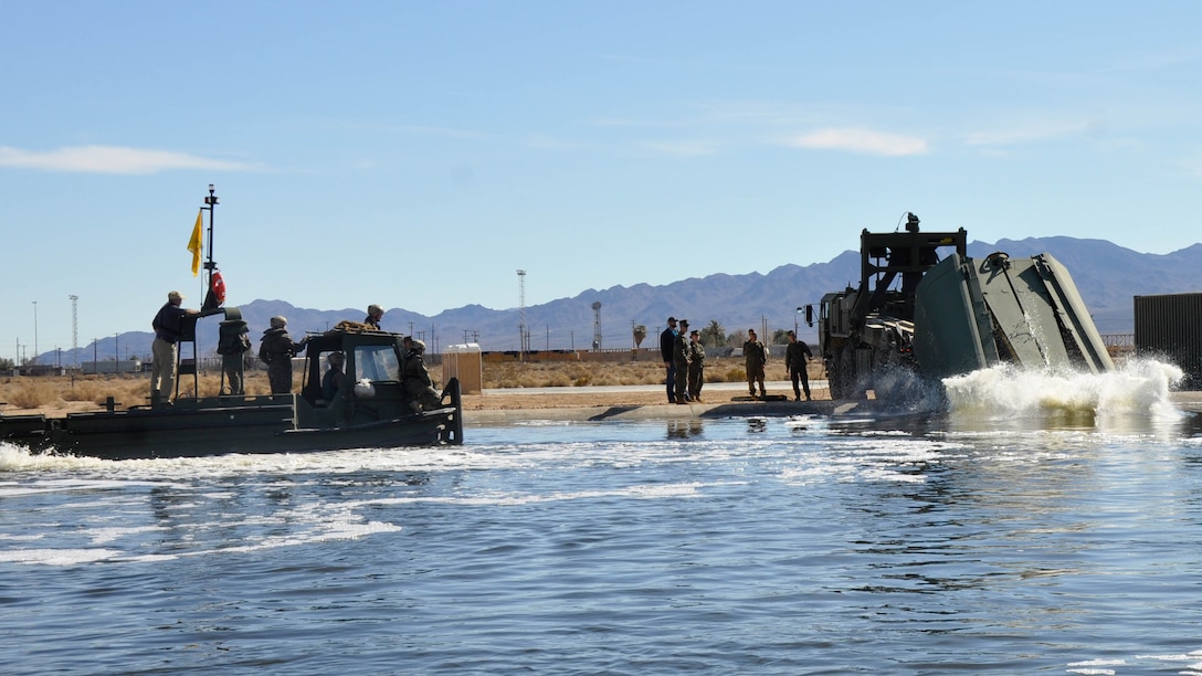 Marines with 7th Engineer Support Battalion from Marine Corps Base Camp Pendleton, Calif., test Improved Ribbon Bridge components with representatives from Marine Corps Systems Command, and Marine Corps Engineer School, at Production Plant Barstow's test pond aboard Marine Corps Logistics Base Barstow’s Yermo Annex, Calif., Jan. 25, 2016