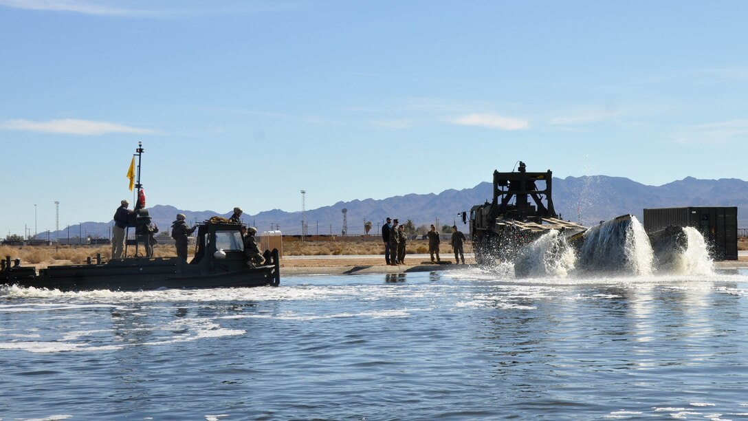 Marines with 7th Engineer Support Battalion from Marine Corps Base Camp Pendleton, Calif., test Improved Ribbon Bridge components with representatives from Marine Corps Systems Command, and Marine Corps Engineer School, at Production Plant Barstow's test pond aboard Marine Corps Logistics Base Barstow’s Yermo Annex, Calif., Jan. 25, 2016
