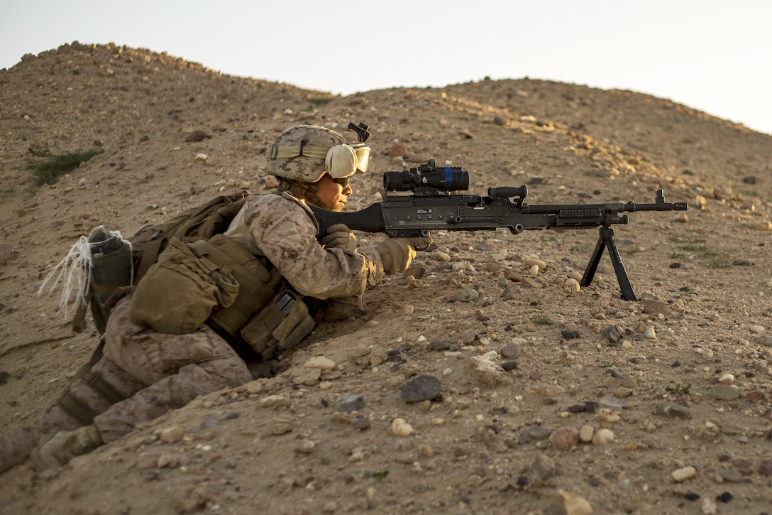 Marine Corps Lance Cpl. Joseph Brewer provides security during a tactical exercise to recover aircraft and personnel at an undisclosed location in Southwest Asia, Jan. 25, 2016. Brewer is a machine gunner assigned to Charlie Company, 1st Battalion, 7th Marine Regiment, Special Purpose Marine Air-Ground Task Force Crisis Response Central Command. Marine Corps photo by Cpl. Akeel Austin
