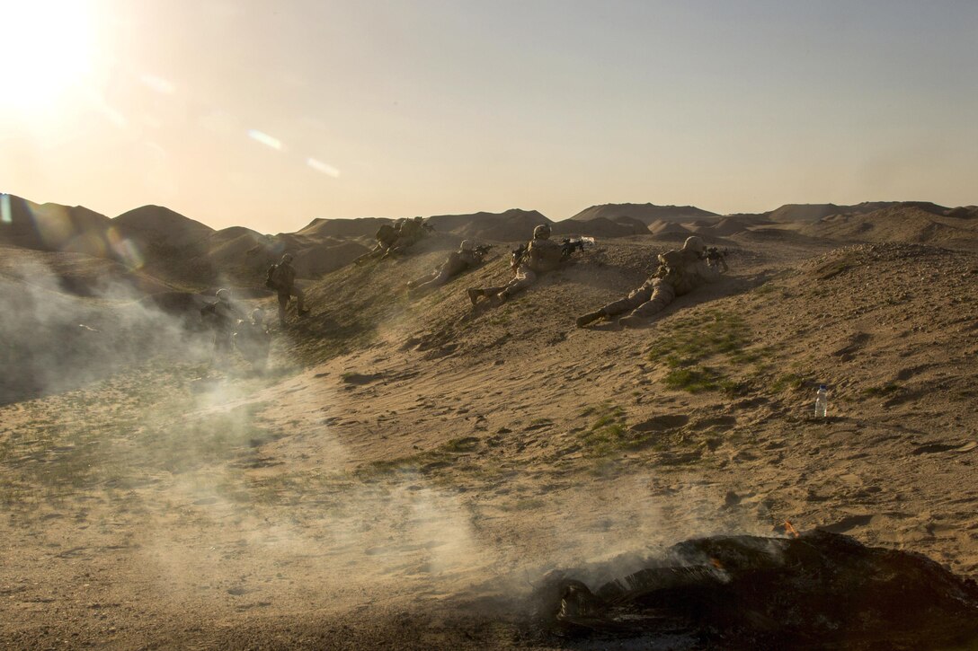 Marines provide security during a tactical exercise to recover aircraft and personnel at an undisclosed location in Southwest Asia, Jan. 26, 2016. Marine Corps photo by Cpl. Akeel Austin