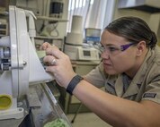 Staff Sgt. Tasha Johnson, the 71st Medical Group dental lab technician, fabricates an orthodontic model at the dental lab at Vance Air Force Base, Oklahoma, Jan. 25. While the Vance dental lab fabricates a range of dental prostheses, its capabilities aren’t limited to dental items. Johnson also fabricates gear for the flying community, such as customized hearing devices for air traffic controllers. (U.S. Air Force photo / David Poe)