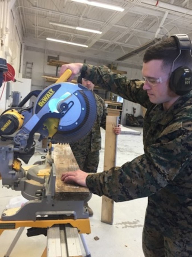 On January 26, 2016 Second Lieutenants Andy McDougall and Michael Land, Marines attached to Combat Engineer Officer course 3-16 (CEO 3-16) at Marine Corps Engineer School Camp Lejeune, N.C., cut boards to dimensional requirements in order to build a wall during a practical application for the vertical construction class.  
