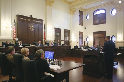 Col. Matt Isler, 12th Flying Training Wing commander, thanks the Bexar County Commissioner’s Court for their support during its meeting at the Bexar County Courthouse Jan. 26, 2016. The commissioner’s court passed a resolution adopting the Joint Land Use Study to promote compatible land use between the county and Joint Base San Antonio-Randolph. 