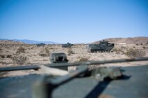 U.S. Marines with 3rd Battalion, 3rd Marine Regiment, 3rd Marine Division, move into an offensive position in amphibious assault vehicles to conduct a simulated urban assault during Integrated Training Exercise 2-16 at Marine Corps Air Ground Combat Center Twentynine Palms, Calif., Jan. 26, 2016. The training was conducted to strengthen unit coordination and maneuvers during urban terrain assaults. (U.S. Marine Corps photo by Cpl. Trever A. Statz/Released)