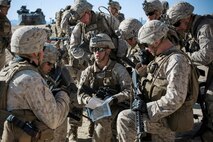 U.S. Marines with 3rd Battalion, 3rd Marine Regiment, 3rd Marine Division, conduct an urban terrain assault during Integrated Training Exercise 2-16 at Marine Corps Air Ground Combat Center Twentynine Palms, Calif., Jan. 26, 2016. The training was conducted to strengthen unit coordination and maneuvers during urban terrain assaults. (U.S. Marine Corps photo by Cpl. Trever A. Statz/Released)