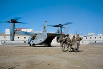 U.S. Marines and a Navy Corpsman with 3rd Battalion, 3rd Marine Regiment, 3rd Marine Division, perform a simulated casualty evacuation during an urban terrain assault during Integrated Training Exercise 2-16 at Marine Corps Air Ground Combat Center Twentynine Palms, Calif., Jan. 26, 2016. The training was conducted to strengthen unit coordination and maneuvers during urban terrain assaults. (U.S. Marine Corps photo by Cpl. Trever A. Statz/Released)