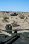 U.S. Marines with 3rd Battalion, 3rd Marine Regiment, 3rd Marine Division, move into an offensive position in amphibious assault vehicles to conduct a simulated urban assault during Integrated Training Exercise 2-16 at Marine Corps Air Ground Combat Center Twentynine Palms, Calif., Jan. 26, 2016. The training was conducted to strengthen unit coordination and maneuvers during urban terrain assaults. (U.S. Marine Corps photo by Cpl. Trever A. Statz/Released)