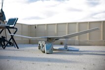 A Raven drone is staged before flight while U.S. Marines with 3rd Battalion, 3rd Marine Regiment, 3rd Marine Division, participate in urban defensive training during Integrated Training Exercise 2-16 at Marine Corps Air Ground Combat Center Twentynine Palms, Calif., Jan. 29, 2016. The training was conducted to strengthen unit coordination and maneuvers during urban terrain assaults. (U.S. Marine Corps photo by Cpl. Trever A. Statz/Released)