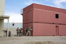 U.S. Marines with 3rd Battalion, 3rd Marine Regiment, 3rd Marine Division, provide security during urban defensive training during Integrated Training Exercise 2-16 at Marine Corps Air Ground Combat Center Twentynine Palms, Calif., Jan. 29, 2016. The training was conducted to strengthen unit coordination and maneuvers during urban terrain assaults. (U.S. Marine Corps photo by Cpl. Trever A. Statz/Released)
