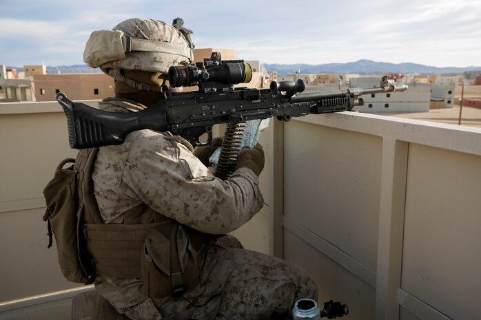 U.S. Marine Corps Lance Cpl. Harold Stalworth, a rifleman with 3rd Battalion, 3rd Marine Regiment, 3rd Marine Division, provides security on a rooftop during urban defensive training during Integrated Training Exercise 2-16 at Marine Corps Air Ground Combat Center Twentynine Palms, Calif., Jan. 29, 2016. The training was conducted to strengthen unit coordination and maneuvers during urban terrain assaults. (U.S. Marine Corps photo by Cpl. Trever A. Statz/Released)