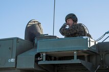 U.S. Marine Corps Maj. Gen. Daniel O'Donohue, commanding general of 1st Marine Division, rides in a Light Armored Vehicle during Integrated Training Exercise 2-16 at Marine Corps Air Ground Combat Center Twentynine Palms, Calif., Jan. 28, 2016. Maj. Gen. Maj. Gen. O'Donohue visited the 1st MARDIV units participating in ITX 2-16. (U.S. Marine Corps photo by Cpl. Trever A. Statz/Released)