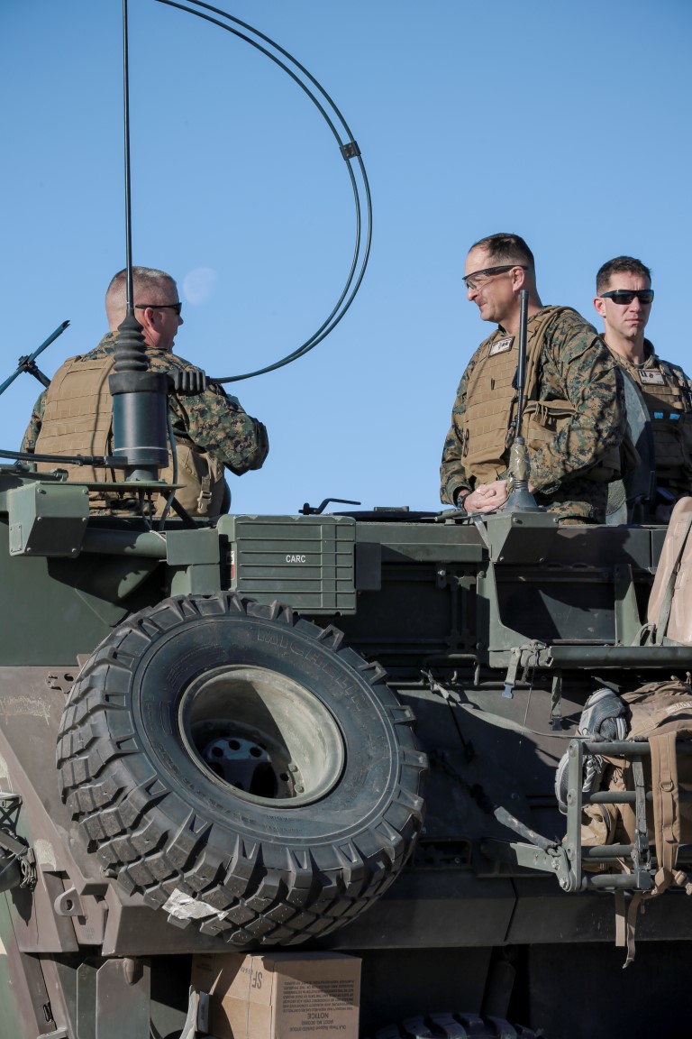 U.S. Marine Corps Maj. Gen. Daniel O'Donohue, commanding general of 1st Marine Division, talks to Col. Jeffrey Tuggle, Assistant Chief of Staff G-3 of 1st MARDIV, before a mechanized assault course during Integrated Training Exercise 2-16 at Marine Corps Air Ground Combat Center Twentynine Palms, Calif., Jan. 28, 2016. Maj. Gen. O'Donohue visited the 1st MARDIV units participating in ITX 2-16. (U.S. Marine Corps photo by Cpl. Trever A. Statz/Released)