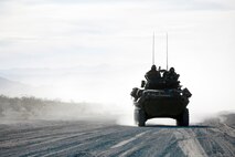 A Light Armored Vehicle with 3rd Light Armored Reconnaissance Battalion, 1st Marine Division, take part in a mechanized assault course (MAC) during Integrated Training Exercise 2-16 at Marine Corps Air Ground Combat Center Twentynine Palms, Calif., Jan. 28, 2016. The training was conducted to strengthen unit coordination and maneuvers during mechanized assaults. (U.S. Marine Corps photo by Cpl. Trever A. Statz/Released)