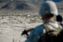 M1A1 Abrams tanks with 1st Tank Battalion, 1st Marine Division, move to their positions during a mechanized assault course during Integrated Training Exercise 2-16 at Marine Corps Air Ground Combat Center Twentynine Palms, Calif., Jan. 28, 2016. The training was conducted to strengthen unit coordination and maneuvers during mechanized assaults. (U.S. Marine Corps photo by Cpl. Trever A. Statz/Released)