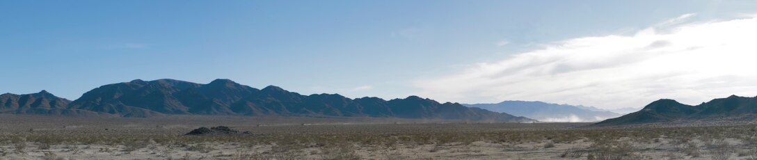 Military vehicles move to their positions during a mechanized assault course during Integrated Training Exercise 2-16 at Marine Corps Air Ground Combat Center Twentynine Palms, Calif., Jan. 28, 2016. The training was one of a series of evolutions that will take place during ITX 2-16, a Marine Air Ground Task Force sized training event led by the 5th Marine Regiment, which will forward deploy later this year with various elements to create the Special Purpose Marine Air Ground Task Force Crisis Response Central Command 16.2. (U.S. Marine Corps photo by Cpl. Trever A. Statz/Released)