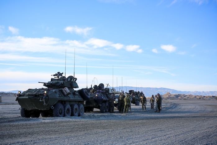 Light armored vehicles with 3rd Light Armored Reconnaissance Battalion, 1st Marine Division, take part in a mechanized assault course (MAC) during Integrated Training Exercise 2-16 at Marine Corps Air Ground Combat Center Twentynine Palms, Calif., Jan. 28, 2016. The training was conducted to strengthen unit coordination and maneuvers during mechanized assaults. (U.S. Marine Corps photo by Cpl. Trever A. Statz/Released)