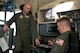 U.S. Air Force Reserve Senior Master Sgt. Duane Moore and Master Sgt. Dave Hemphill, discuss takeoff and landing data prior to the last training mission flight of a C-130H assigned to the 913th Airlift Group at Little Rock Air Force Base, Ark., Jan. 28, 2016. The final two-hour mission consisted of low level air drop techniques and pilot proficiency training. Both Airmen are flight engineers assigned to the 327th Airlift Squadron at Little Rock AFB. (U.S. Air Force photo by Master Sgt. Jeff Walston/Released)