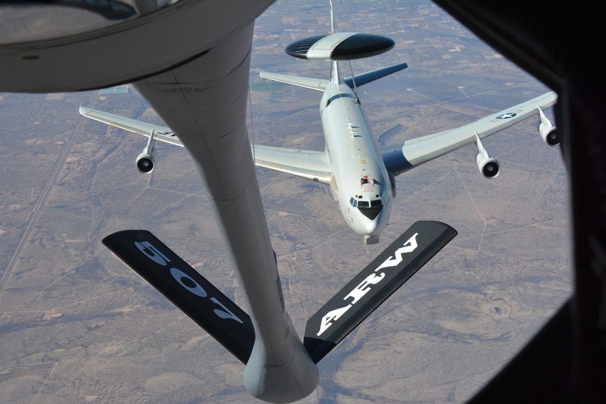 An Air Force Reserve Command KC-135R Stratotanker refueling boom moves into position to conduct an aerial refueling with an E-3 Airborne Warning and Control System aircraft over Texas during a Congressional orientation flight, Jan. 19, 2016. (U.S. Air Force photo/Maj. Jon Quinlan) 