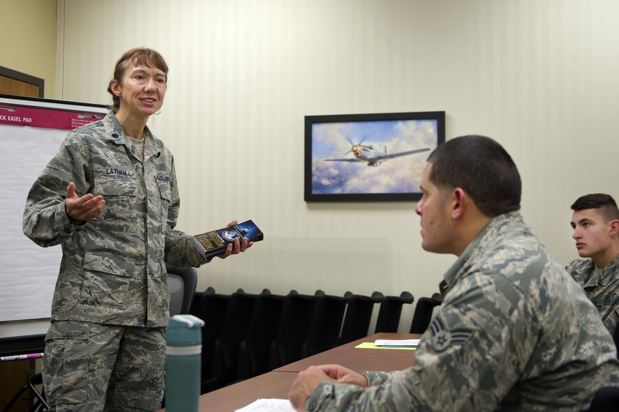 Lt. Col. Patricia Latham, 434th Air Refueling Wing process manager, speaks about the 434th Air Refueling Wing 2016 mission and vision during a newcomer’s orientation at Grissom Air Reserve Base, Ind., Jan. 10, 2015. Latham is responsible for overseeing effective process improvement efforts to ensure efficient, cost saving and compliance with Air Force instructions.  (U.S. Air Force photo/Tech. Sgt. Benjamin Mota)
