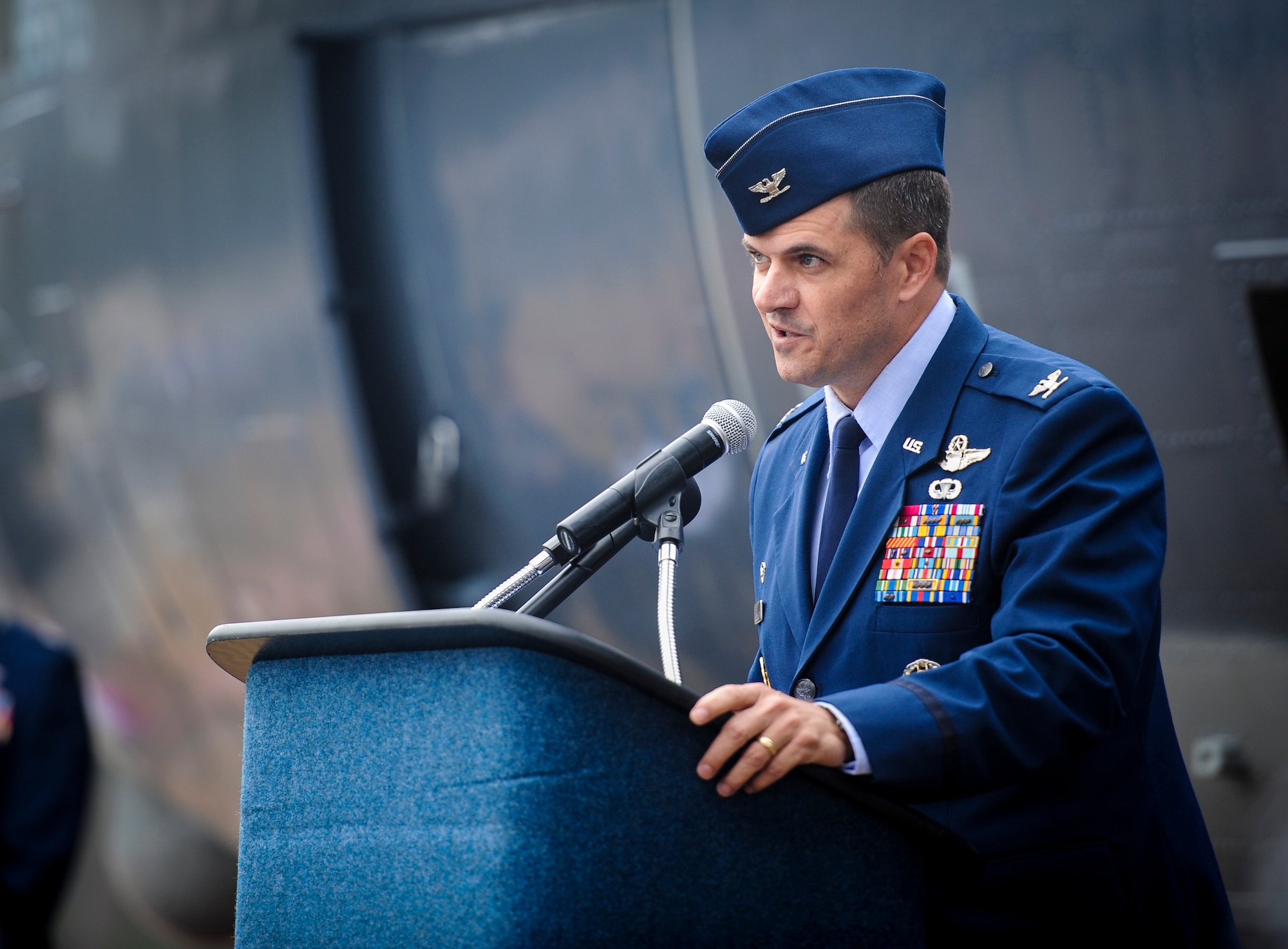 Col. Sean Farrell, commander of the 1st Special Operations Wing, speaks to guests during the AC-130H Spectre dedication ceremony at Hurlburt Field, Fla., Jan. 2, 2016. The Spectre played a role in operations all over the world, first in Vietnam, proceeding into the latter of the 20th century with operations Eagle Claw, Urgent Fury, Just Cause and Desert Storm. The last operational years of the AC-130H Spectre were spent flying combat missions in the Balkans and Somalia, and in Afghanistan in support of Operation Enduring Freedom. (U.S. Air Force photo by Senior Airman Meagan Schutter)