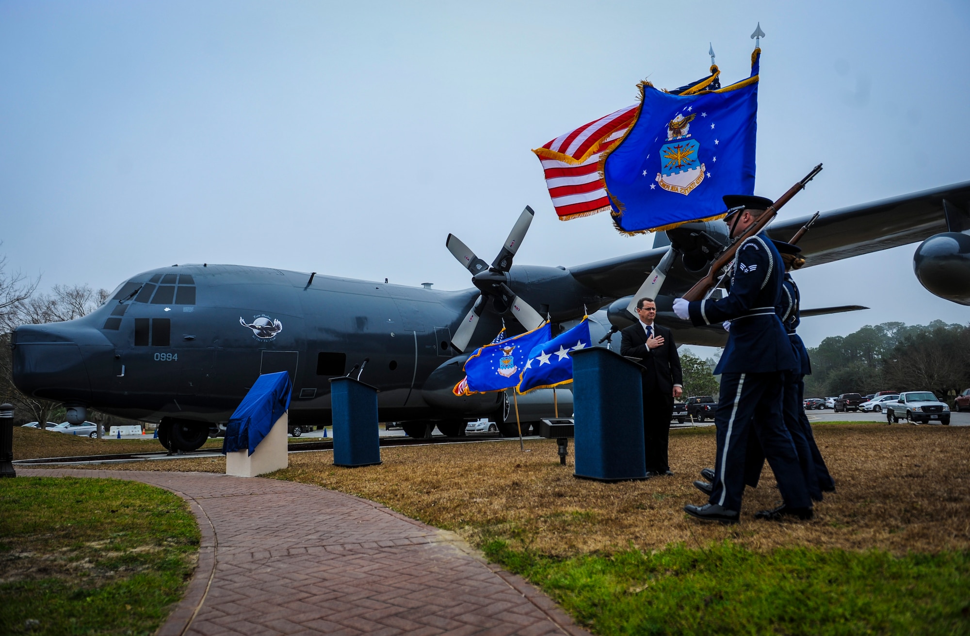 Hurlburt Field Base Honor Guard members present the colors before the MC-130P Combat Shadow dedication ceremony at Hurlburt Field, Fla., Feb. 2, 2016. More than 400 people attended the dedication ceremonies for the AC-130H Spectre and MC-130P Combat Shadow to honor the legacy of these aircraft at the air park.  As the aircraft retire, the Air Force and Air Force Special Operations Command modernize the fleet with the AC-130J Ghostrider and MC-130J Commando II. (U.S. Air Force photo by Senior Airman Meagan Schutter)