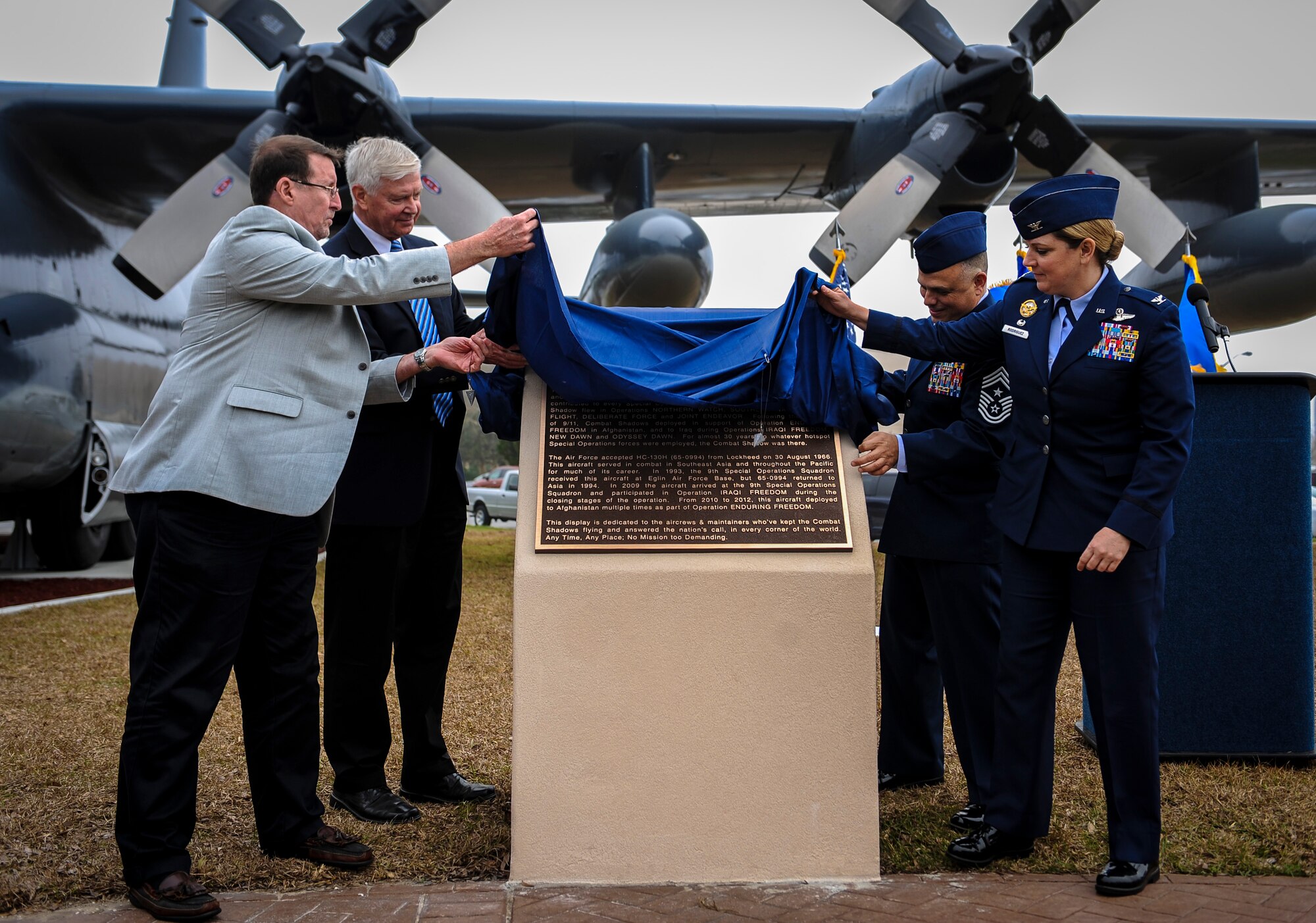 A plaque honoring the MC-130P Combat Shadow is unveiled during a dedication ceremony at Hurlburt Field, Fla., Feb. 2, 2016. The Combat Shadow supported Special Operations missions worldwide including: operations Just Cause, Desert Storm, Northern and Southern Watch, Deny Flight, Deliberate Force and Joint Endeavor.  After 9/11, the Combat Shadow supported Special Operations Forces during the final stages of Operation Iraqi Freedom and deployed multiple times as part of Operation Enduring Freedom. (U.S. Air Force photo by Senior Airman Meagan Schutter)