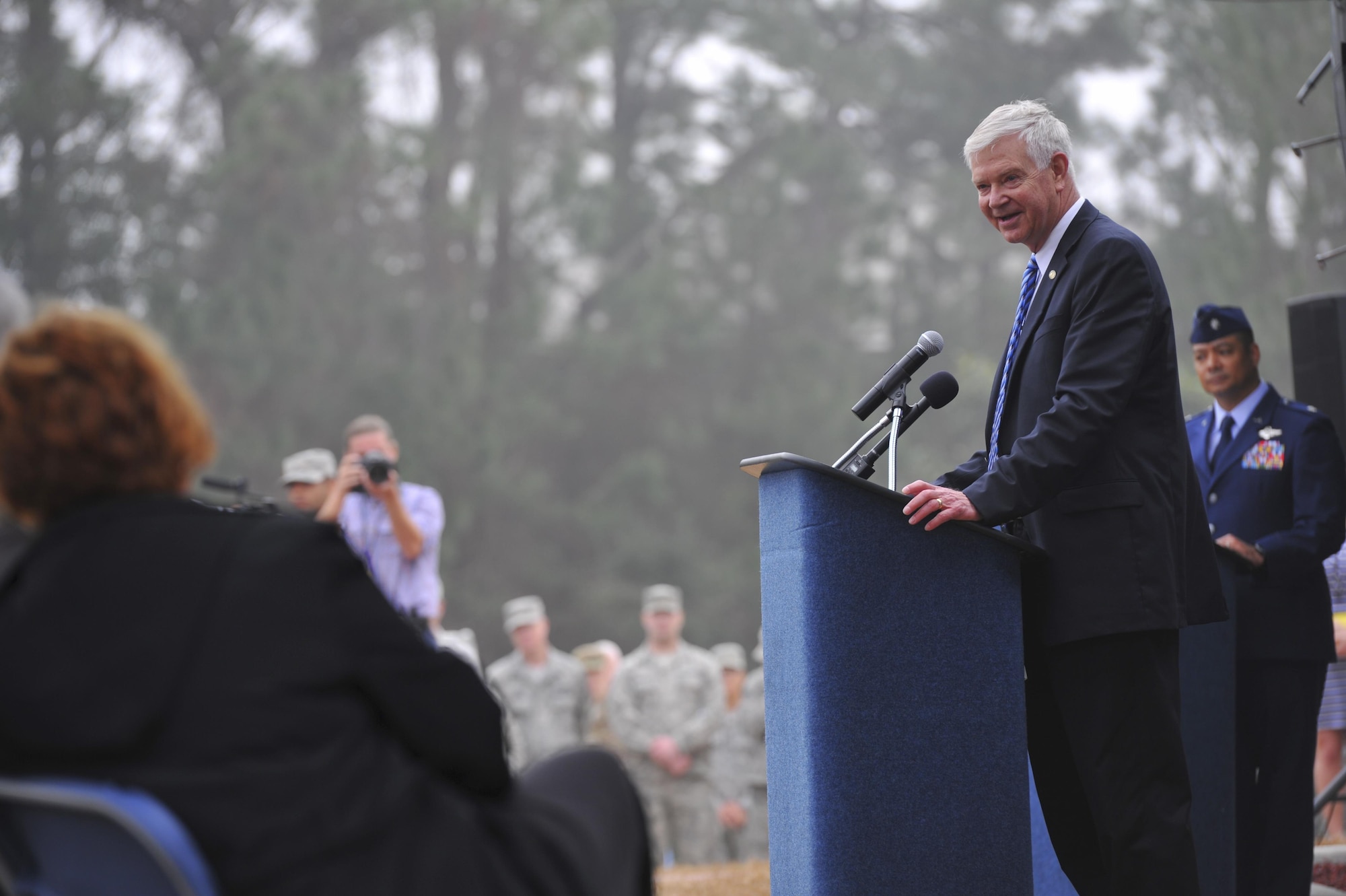 Retired Gen. Charles Holland, former commander of U.S. Special Operations Command and Air Force Special Operations Command, speaks during an AC-130H Spectre dedication ceremony February 2, 2016, at Hurlburt Field, Fl. More than 400 people attended the dedication ceremonies for the AC-130H Spectre and MC-130P Combat Shadow to honor the legacy of these aircraft at the air park. As the aircraft retire, the Air Force and Air Force Special Operations Command modernize the fleet with the AC-130J Ghostrider and MC-130J Commando II. (U.S. Air Force photo by Airman 1st Class Joseph Pick)