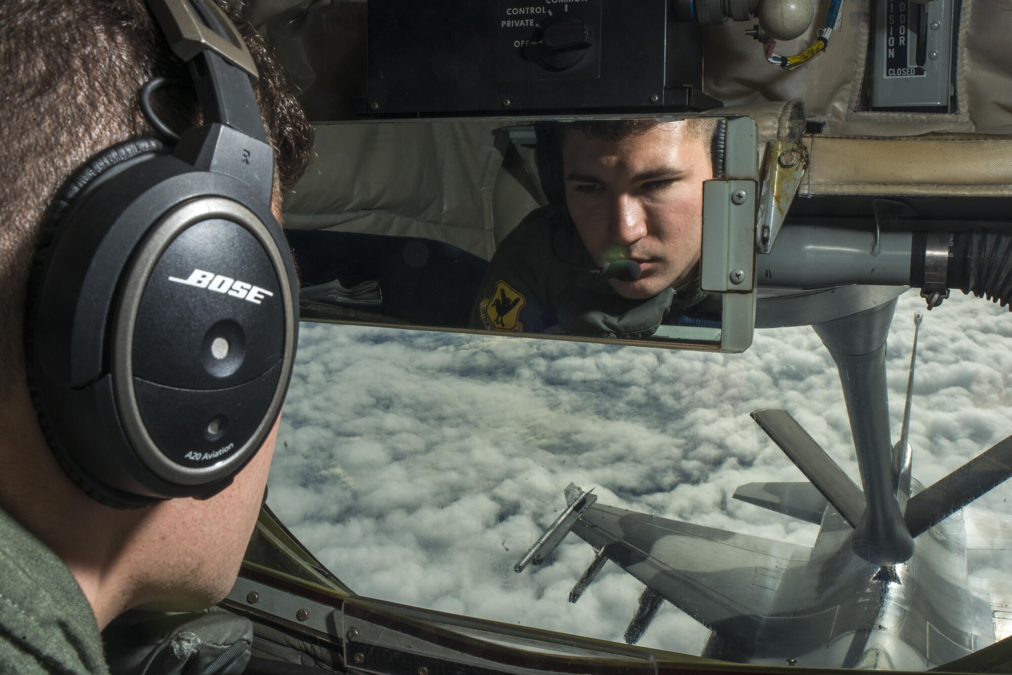 U.S. Air Force Airman 1st Class Ryan Hortman, 909th Air Refueling Squadron boom operator, refuels an 18th Aggressor Squadron F-16 Fighting Falcon during Forceful Tiger Jan. 28, 2016, near Okinawa, Japan. The KC-135 has provided the ability to project forces anywhere in the world since it first entered the service in 1957. (U.S. Air Force photo by Staff Sgt. Maeson L. Elleman/Released)