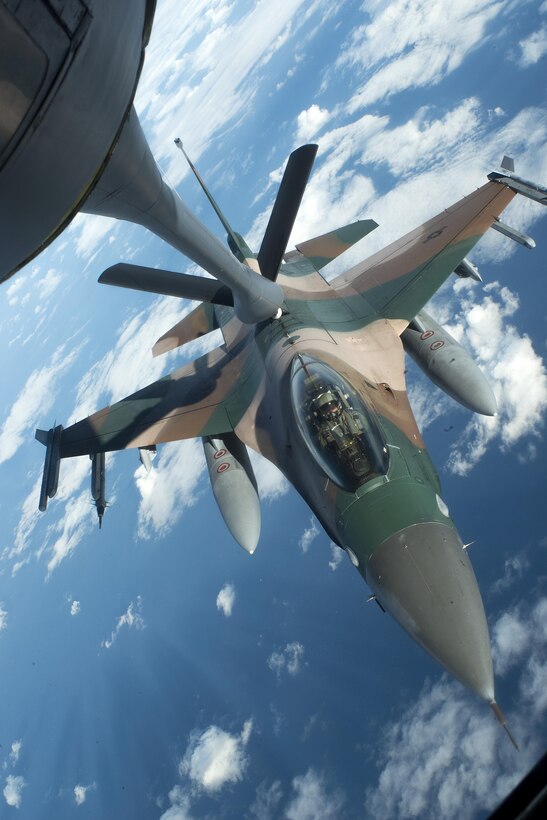 A U.S. Air Force F-16 Fighting Falcon from the 18th Aggressor Squadron refuels from a KC-135 Stratotanker during Forceful Tiger Jan. 28, 2016, near Okinawa, Japan. The F-16 is a compact, multi-role fighter aircraft designed to provide air-to-air combat and air-to-surface attack capabilities as a relatively low-cost, high-performance weapon system for the U.S. and allied nations. (U.S. Air Force photo by Staff Sgt. Maeson L. Elleman)
