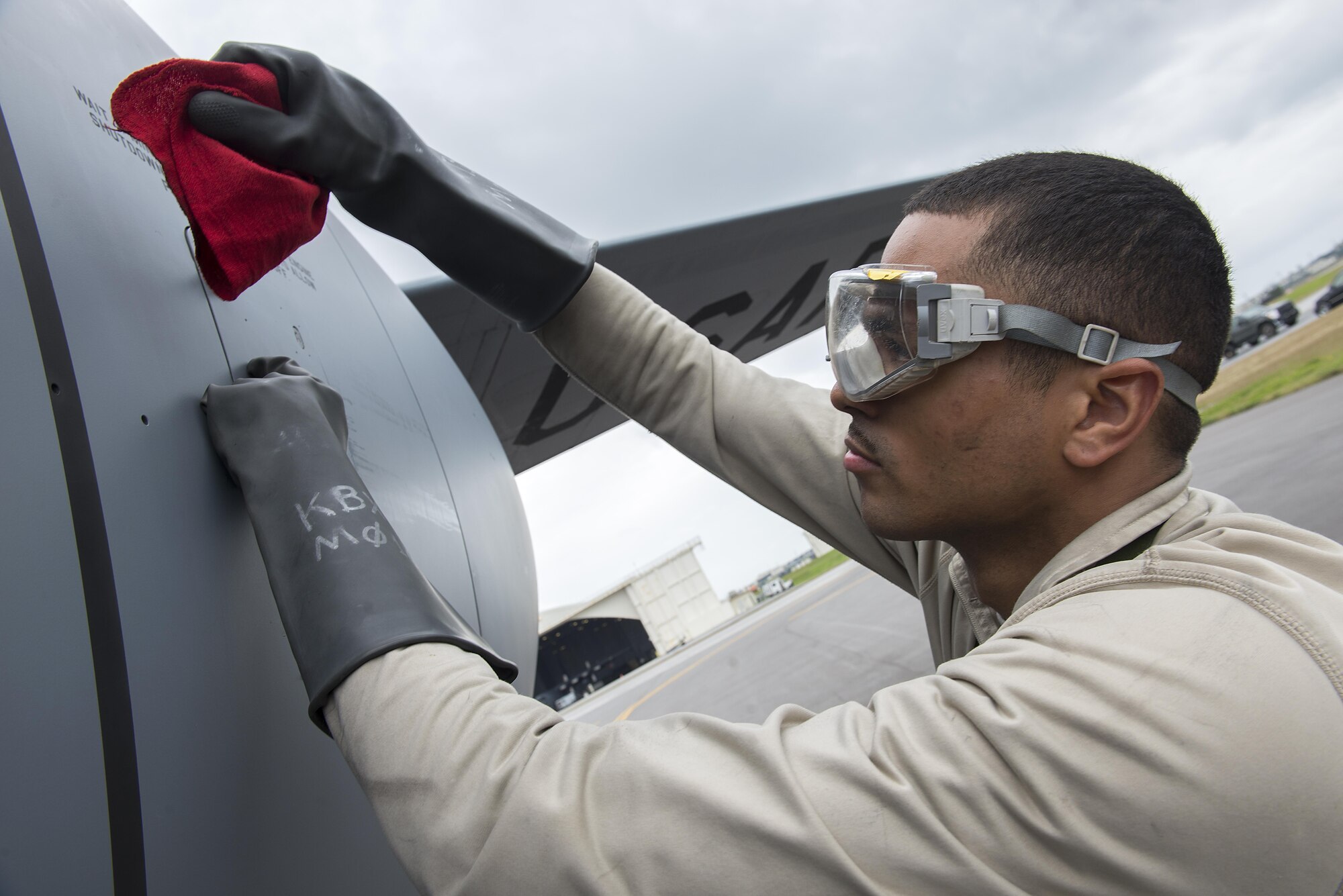 U.S. Air Force Senior Airman Michael Lawrence, 909th Aircraft Maintenance Unit crew chief, performs engine oil checks on a KC-135 Stratotanker following its flight in support of Forceful Tiger Jan. 28, 2016, at Kadena Air Base, Japan. Air Force maintainers are the backbone for providing the force with highly capable aircraft capable of supporting and defending allies all around the globe. Without the diligence of the 909th AMU, the quickly aging aircraft would be unable to support the mission in the Indo-Asia-Pacific. (U.S. Air Force photo by Staff Sgt. Maeson L. Elleman/Released)