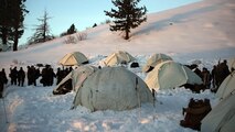 Marines with Combat Logistics Battalion 252 prepare for the day outside of their tents in the mountains of Bridgeport, California, during Mountain Exercise 1-16, a cold weather training exercise, on Jan. 12, 2016. The training is a prerequisite for a large, multi-national exercise called Cold Response 16 that will take place in Norway, March of this year. Cold Response will challenge 12 NATO allies’ and partners’ abilities to work together and respond in the case of a crisis. 