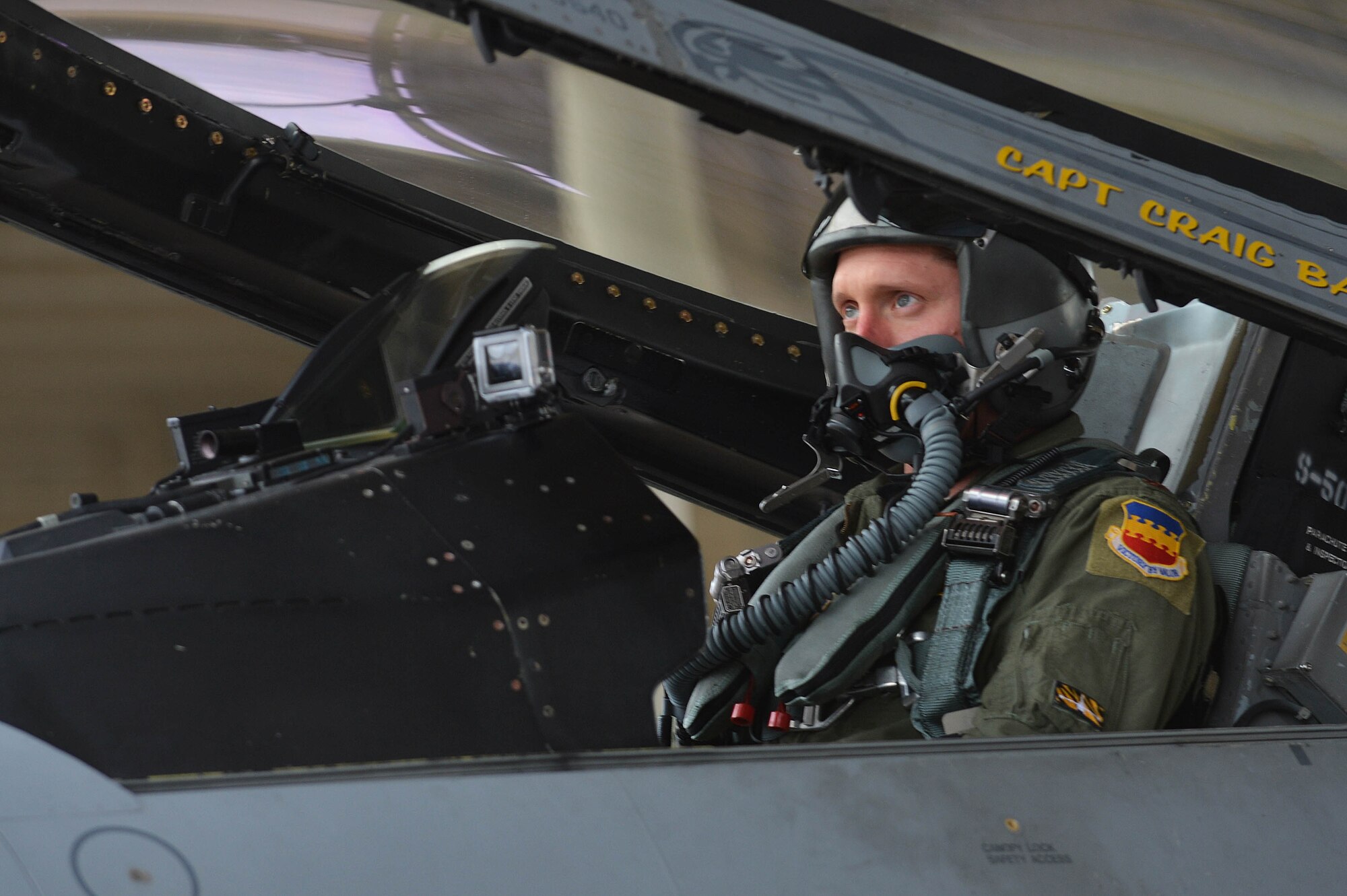 U.S. Air Force Maj. Craig Baker, Viper Demonstration Team pilot, prepares to fly an aerial demonstration during practice at Shaw Air Force Base, S.C., Jan. 27, 2016. Baker undergoes eight to nine times the force of gravity every time he performs an aerial demonstration. (U.S. Air Force photo by Senior Airman Diana M. Cossaboom)