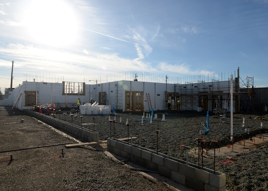 The 9th Civil Engineer Squadron’s Administration and Operations Facility is in the progress of construction on Jan. 27, 2016, at Beale Air Force Base, California. The contractors are erecting walls using insulated concrete forms designed to be energy efficient.  The facility is a replacement of the last, which was lost in a fire in January 2013. (U.S. Air Force photo by Senior Airman Ramon A. Adelan) 