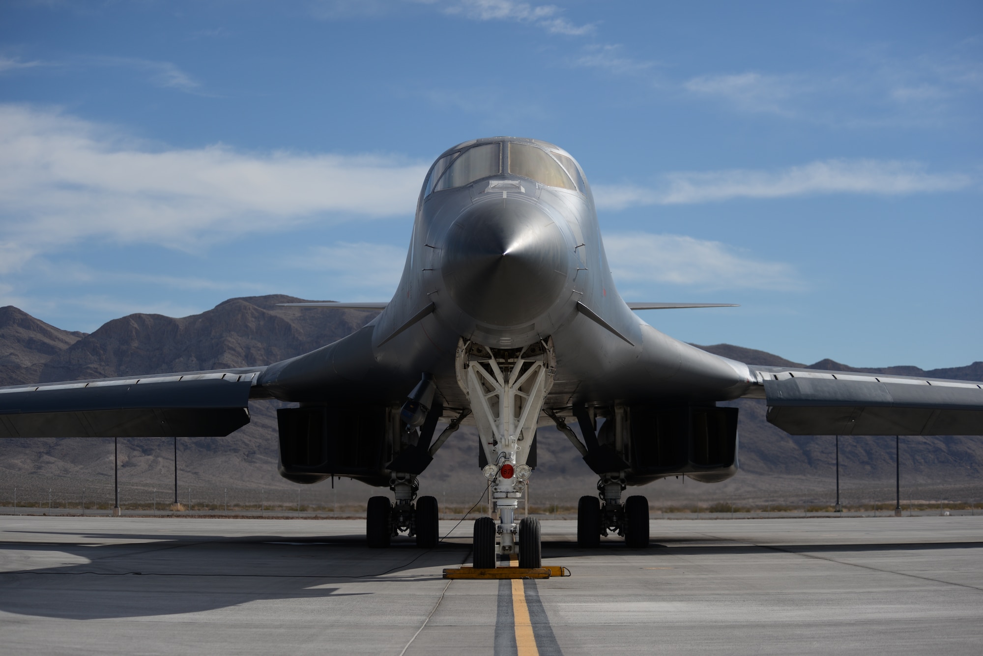 A B-1B Lancer, assigned to the 7th Bomb Wing, Dyess Air Force Base, Texas, sits on the flight line before take-off during Red Flag 16-1 at Nellis Air Force base, Nev., Jan. 29, 2016. Red Flag is one of a series of advanced training programs administered by the U.S. Air Force Warfare Center. (U.S. Air Force Photo by Airman 1st Class Kevin J. Tanenbaum)