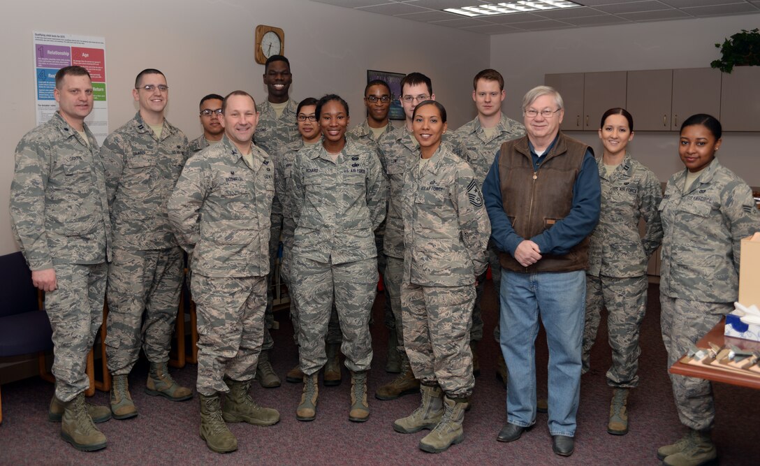 Col. Gentry Boswell, 28th Bomb Wing commander, front left, recognizes volunteers during the base Tax Center’s 2016 grand opening at Ellsworth Air Force Base, S.D., Jan. 28, 2016. Active-duty members, dependents and retirees can make an appointment to file their taxes at the center Monday through Friday from 9 a.m. to 3 p.m., to schedule an appointment call (605) 385-8298. (U.S. Air Force photo by Airman Donald Knechtel/Released)