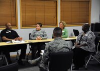 Warriors of the North discuss money and marriage Feb. 2, 2016, on Grand Forks Air Force Base, N.D. The Airman & Family Readiness Center hosted the first of six classes during Military Saves Month. Each class covers several different financial topics and help to inform Airmen about different services provided on base. (U.S. Air Force photo by Airman 1st Class Ryan Sparks/Released)