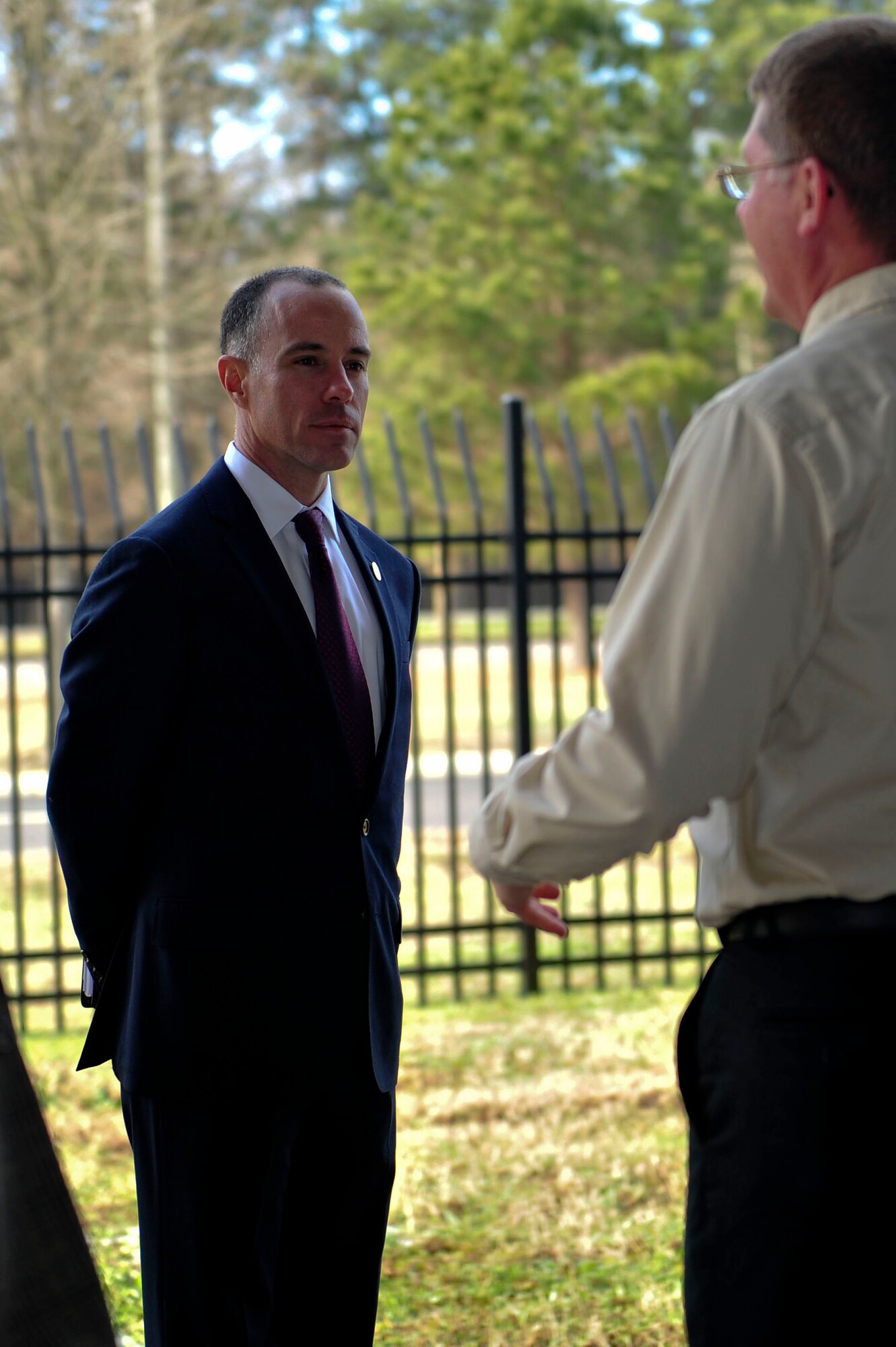 Charles Bowery, Jr., the new U.S. Army Chief of Military History, listens to David Hanselman, director of the U.S. Army Transportation Museum, during a tour of the facility at Fort Eustis, Va., Jan. 27, 2016. Holding great significance to him, the museum helped to inspire Bowery to become a U.S. Soldier. (U.S. Air Force photo by Senior Airman Breonna Veal)