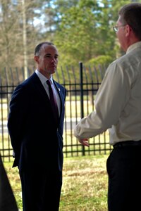 Charles Bowery, Jr., the new U.S. Army Chief of Military History, listens to David Hanselman, director of the U.S. Army Transportation Museum, during a tour of the facility at Fort Eustis, Va., Jan. 27, 2016. Holding great significance to him, the museum helped to inspire Bowery to become a U.S. Soldier. (U.S. Air Force photo by Senior Airman Breonna Veal)