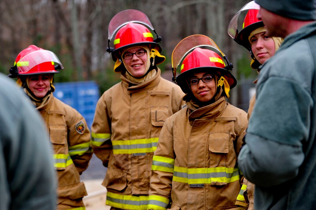 U.S. Army Soldiers assigned to the Maritime Intermodal Training Department (MITD) receive instructions from Sgt. First Class Dwayne Hysmith, MITD primary instructor, during a live-fire training course at Fort Eustis, Va., Jan. 28, 2016. During the training, the instructors emphasized the importance of communication and teamwork needed to safely diffuse a fire. (U.S. Air Force by Senior Airman Breonna Veal)