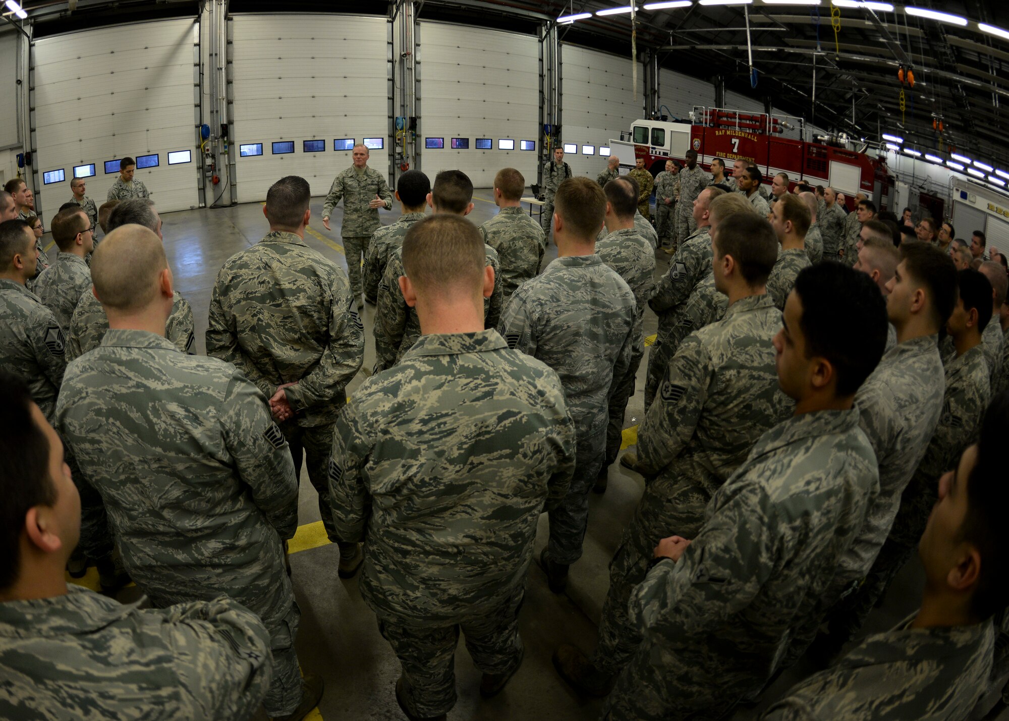 Chief Master Sgt. of the Air Force James Cody speaks with members of the 100th Civil Engineer Squadron Jan. 28, 2016, on RAF Mildenhall, England. Throughout his two-day visit, Cody spoke directly to Airmen, addressing their concerns and questions about the future of the Air Force. (U.S. Air Force photo by Senior Airman Victoria H. Taylor/Released)